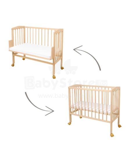 Waldin  Bedside Crib 2in1 Art.297549 Natural Wood Koka 2-in-1 bērnu gultiņa/šūpulis uz riteņiem ar matraci