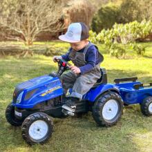 FALK New Holland lielais pedāļu traktors ar piekabi + atveramu pārsegu no 2 gadu vecuma